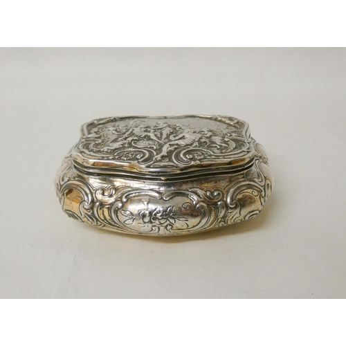 521 - Late 19th century silver box, import marks London 1897, Berthold Muller, of cushion form, the hinged... 