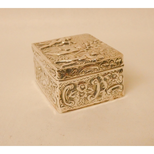 522 - A Victorian silver rectangular trinket box, the embossed hinged lid decorated with classical water c... 