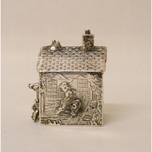 532 - A Dutch novelty miniature cottage, foreign marks to base. 6cms high. 59 grams