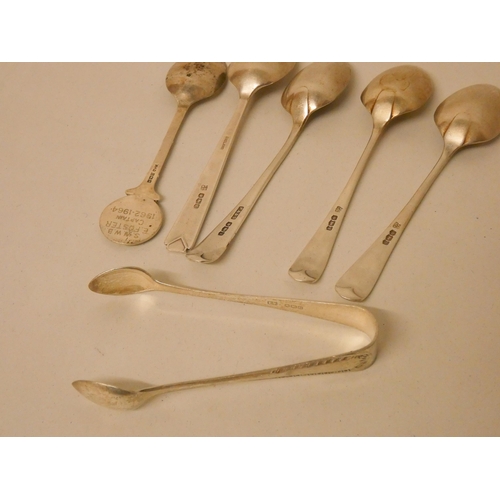 535 - A pair of silver sugar nips and five silver teaspoons, gross weight 3.8 troy oz