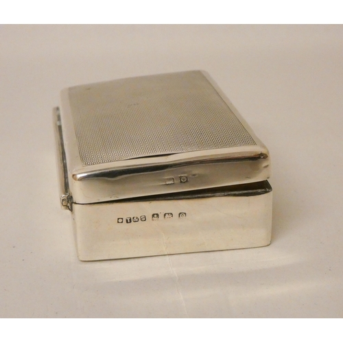 538 - A silver engine turned rectangular box, with hinged lid. 8.7 cms across