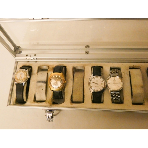 555 - A watch case and a collection of seven  vintage gents wristwatches to include Rotary, Vulcain, Borel... 