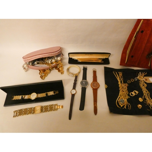 740 - A quantity of gold coloured metal chains, earrings, gilt metal belt, dress watches and costume jewel... 