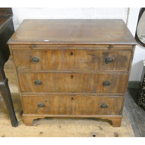 373 - A Georgian mahogany bachelor's chest fitted three long drawers with brushing slide. 3' wide