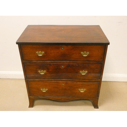 397 - A Georgian mahogany chest of three long drawers with brass handles standing on spayed bracket feet, ... 