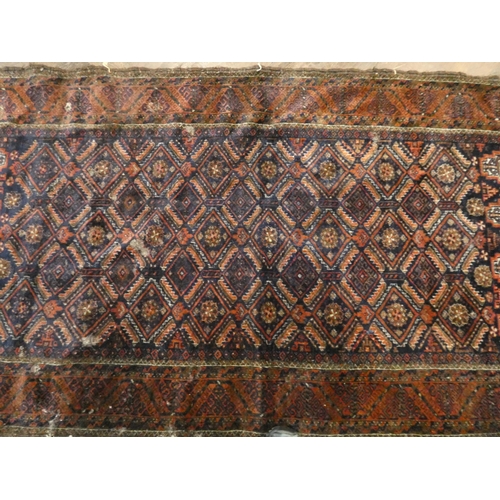 401 - A figured Persian rug and a red and patterned wool pile Persian rug. Both in 