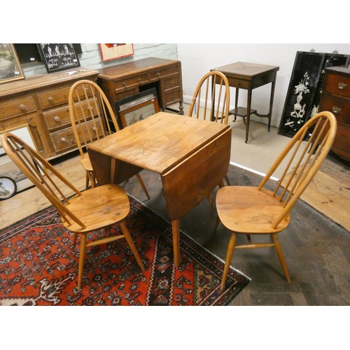 445 - An Ercol blonde elm Windsor drop leaf table and four Ercol Windsor Quaker chairs with blue label.