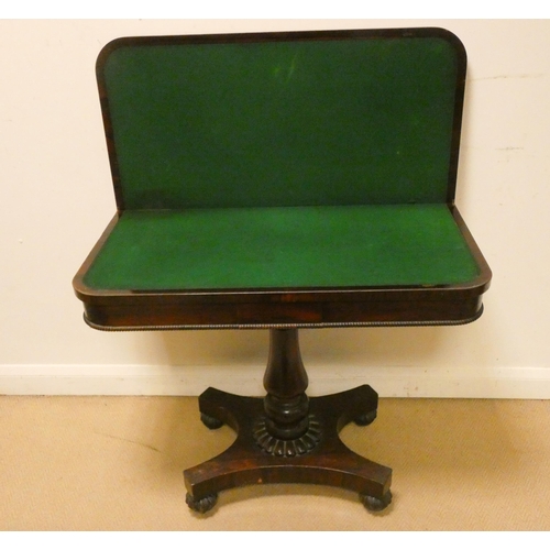 457 - An Victorian rosewood folding top card table on pillar and platform base, 3' wide