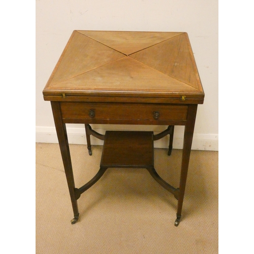 469 - An Edwardian inlaid mahogany envelope topped card table with one drawer and under tier, 21