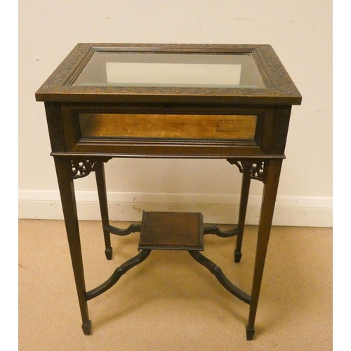 472 - A late Victorian mahogany bijouterie table with carved border and under tier, 19