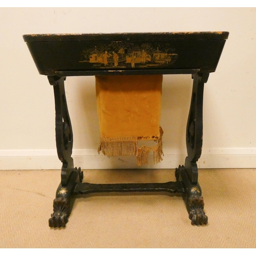 477 - A Victorian and black lacquered and gilt decorated workbox table with fitted interior standing on a ... 