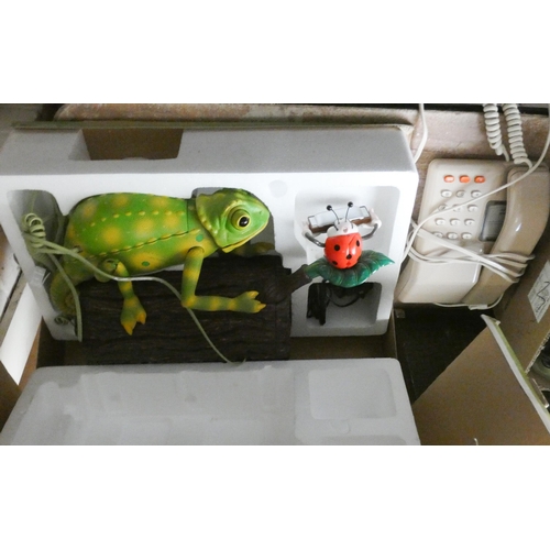 806 - A boxed Karma Chameleon telephone and 1990's push button telephone