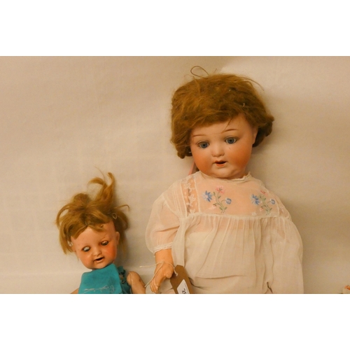 263 - A German Armand Marseille Bisque head doll numbered 996 and another later doll