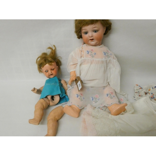 263 - A German Armand Marseille Bisque head doll numbered 996 and another later doll