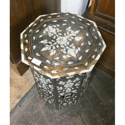 371 - An octagonal Moorish style mother of pearl inlaid coffee table