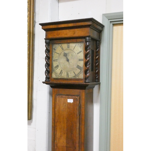 372 - A thirty hour grandfather clock in mahogany case with brass square dial and single hand by William M... 