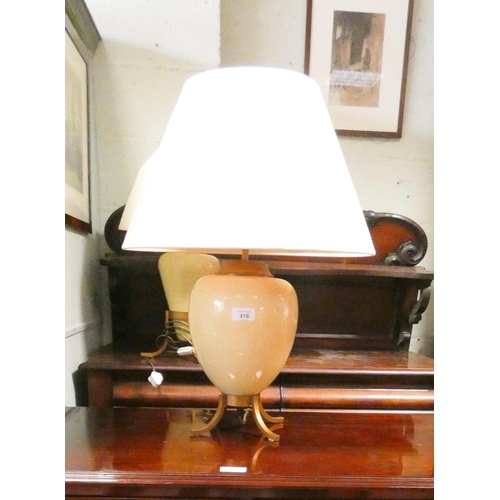 416 - A pair of cream crackleware bulbous style lamps on gilt metal bases with shades and a similar taller... 