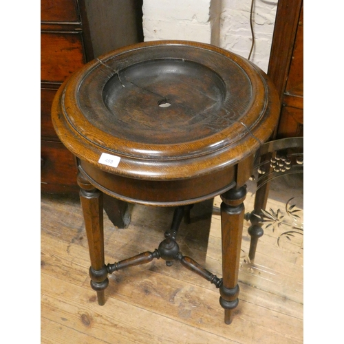 468 - A late Victorian circular oak wash stand on octagonal oak three legged base with cross stretchers (b... 