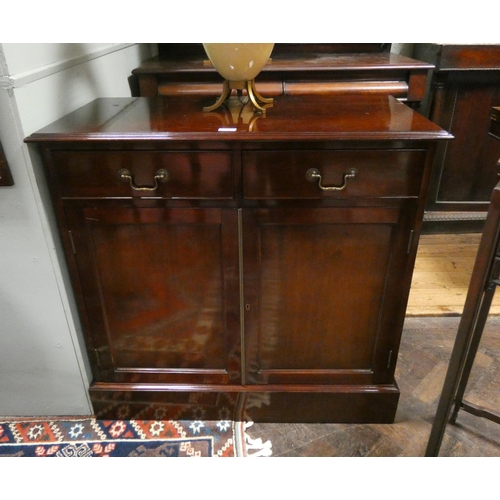 482 - A pair of matching Georgian style mahogany alcove sideboards each fitted two drawers and cupboards, ... 