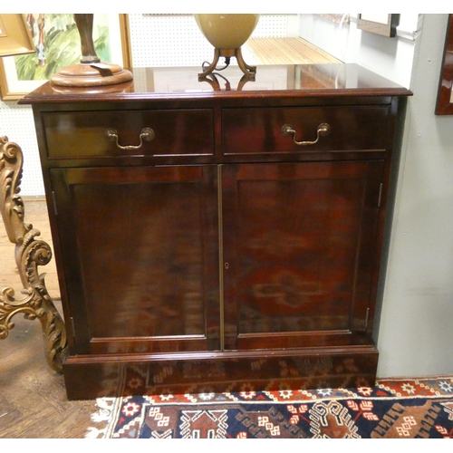 482 - A pair of matching Georgian style mahogany alcove sideboards each fitted two drawers and cupboards, ... 