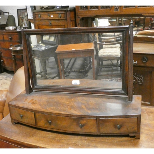 494 - A Georgian mahogany swing toilet mirror with bow front three drawer base