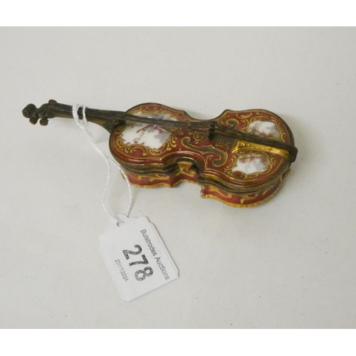 278 - An antique enamel trinket or snuff box, modelled as a cello. With gilt metal mounts, 12cms long