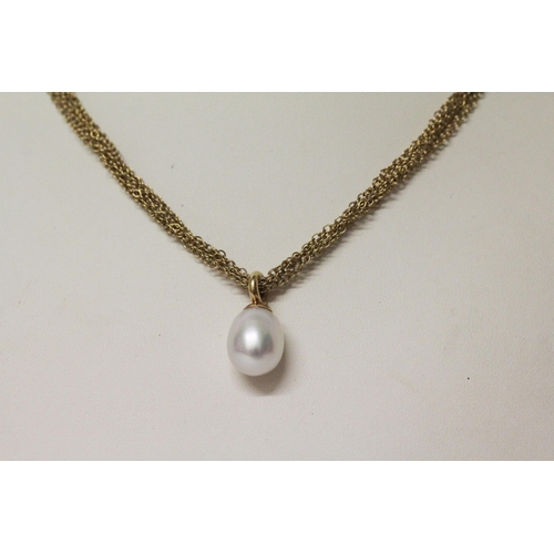 614 - Tiffany - a gold and pearl pendant necklace, large pearl suspended from a six strand mesh 18ct gold ... 