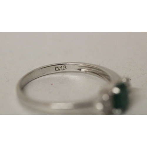 627 - An emerald and diamond ring, on hallmarked 18ct white gold band. Ring size N, 2.8g