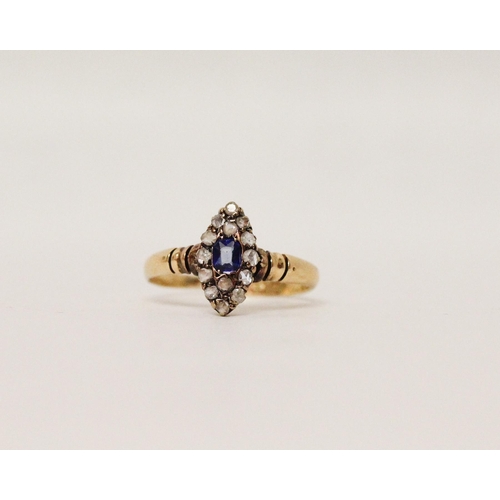 643 - An antique sapphire and diamond marquise panel cluster ring, rose cut diamonds surrounding a cushion... 