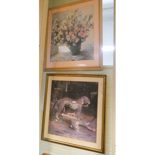 303 - A large framed still life print of flowers and another of leopards