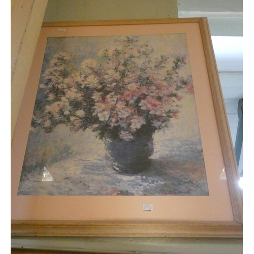 303 - A large framed still life print of flowers and another of leopards