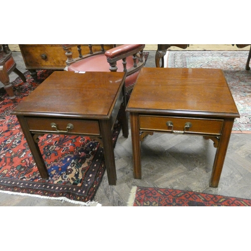 419 - A pair of square reproduction mahogany lamp tables, each fitted one drawer