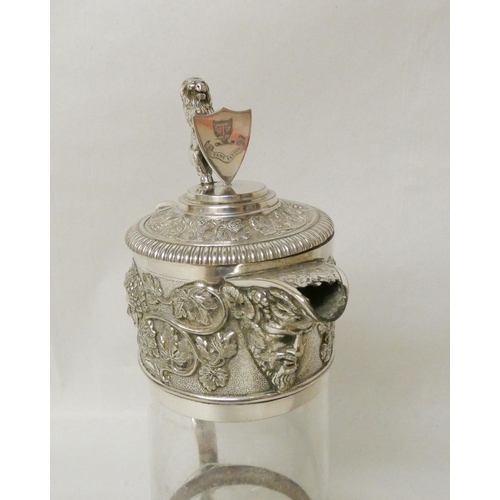 547 - Elkington & Co - Edwardian silver plated and glass claret jug with lion and shield finial