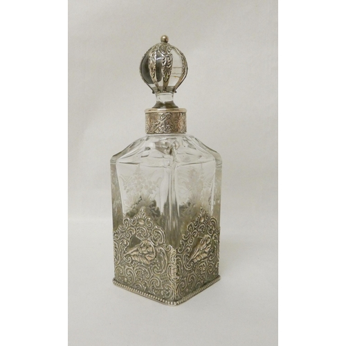 549 - Continental silver mounted cut glass liqueur decanter of large eau de toilette bottle. With silver m... 