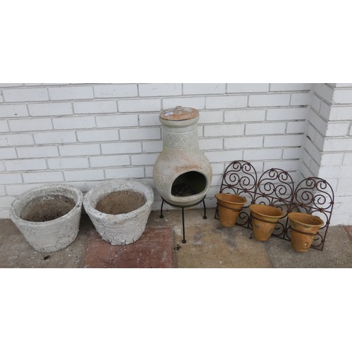 861 - Small clay chimenea, wall mounting planter and pair of pots