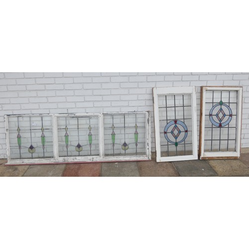 865 - Three leaded glazed windows within metal frame and two leaded glass windows in wooden frames