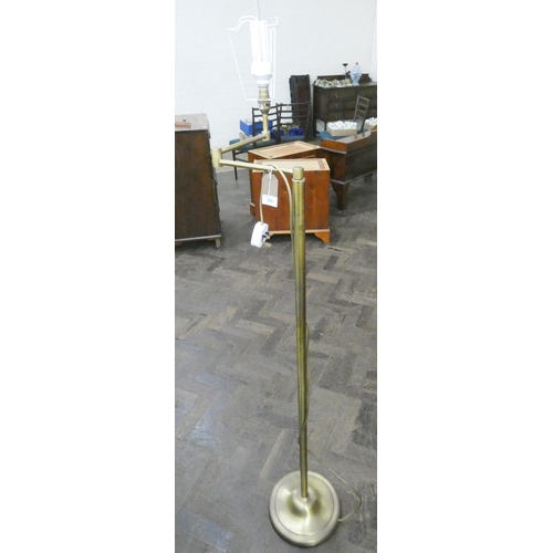 69 - A brass adjustable standard lamp