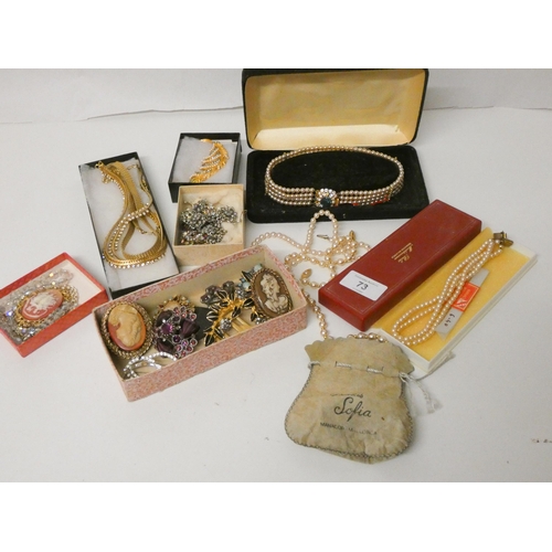 73 - A collection of assorted costume jewellery etc