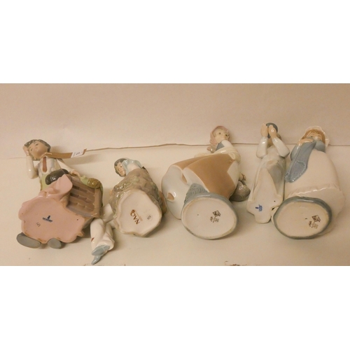 74 - Two Lladro figure ornaments and three Nao figures