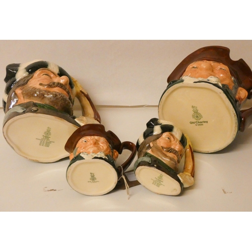 78 - Four Royal Doulton character jugs: Trapper and Old Charlie and two small Doulton mask jugs Old Charl... 