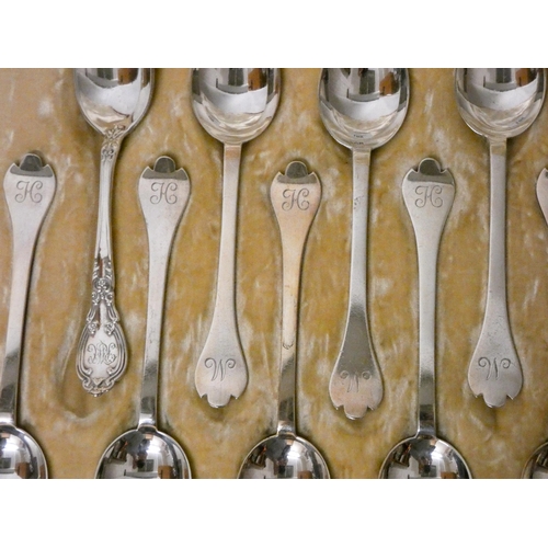 501 - 11 silver tea spoons matching in a case and one odd one! Gross weight 4 oz troy...