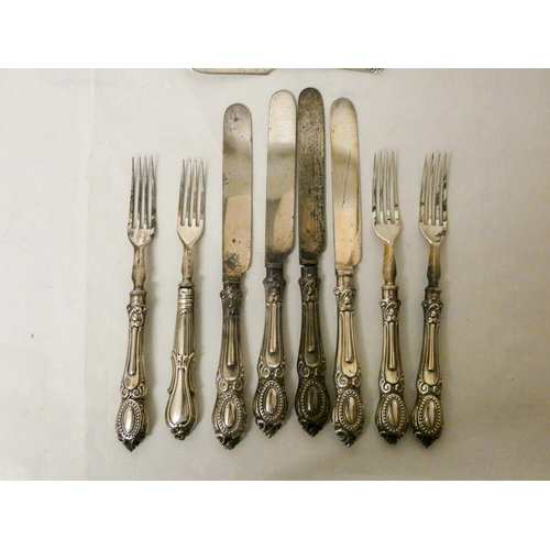 506 - Georgian silver table spoon, American silver spoons and some antique silver handled cutlery....