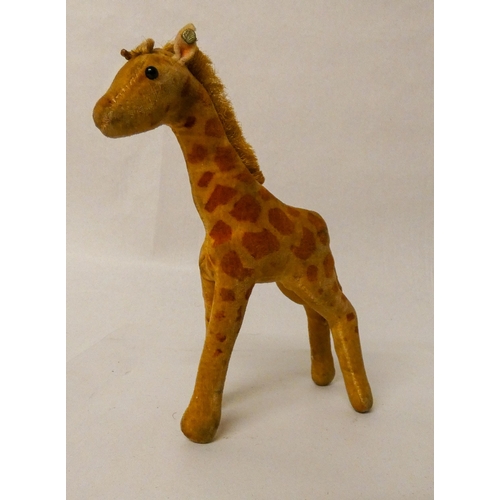 652 - Steiff - vintage model of a baby giraffe, steel button to left ear. 16 cms tall