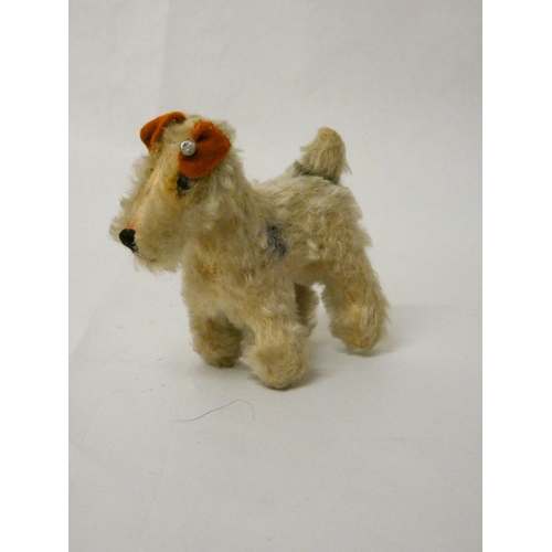 653 - Steiff - vintage miniature mohair model of a Fox Terrier, steel button to left ear. 9.5 cms tall