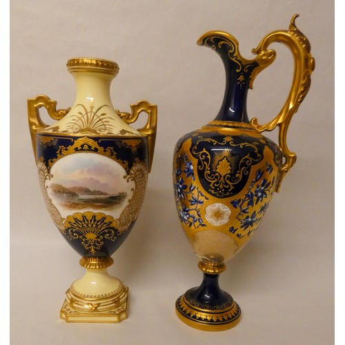 201 - A Coalport twin handled vase painted with a view of the lakes within scale gilt reserves against a b... 