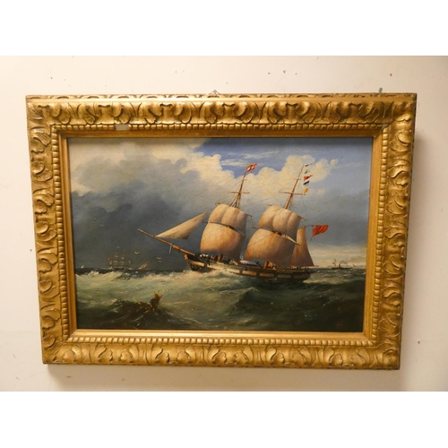 261 - A 19th Century oil on canvas of a British Brigantine off the coast, monogramed W.S, lower right, ima... 