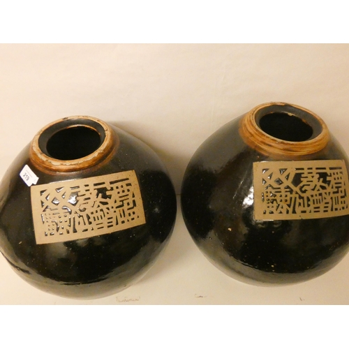 219 - A large pair of Chinese Cheng rice wine vases, standing 45cm tall