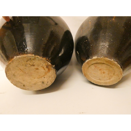 219 - A large pair of Chinese Cheng rice wine vases, standing 45cm tall