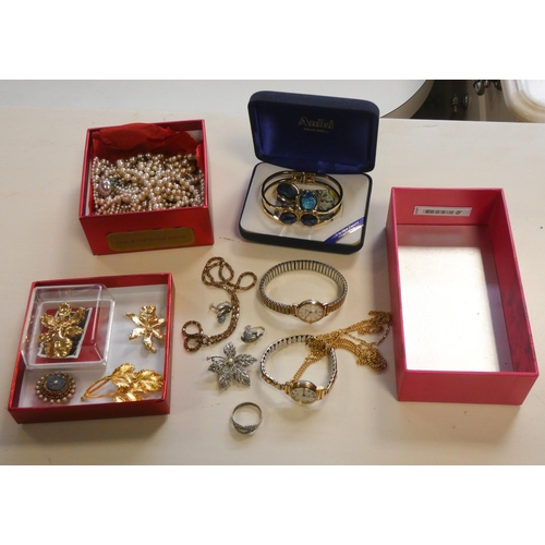 745 - A small quantity of costume jewellery to include brooches, dress rings, watches, a Made in New Zeala... 