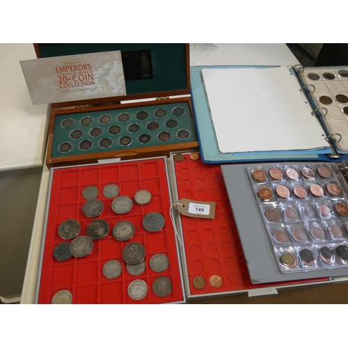 749 - A collection of English and foreign coinage to include crowns, threepences within coin albums and di... 